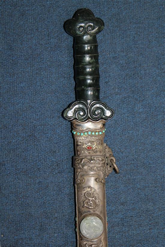 A Chinese jadeite, coral and hardstone mounted silver sword, early 20th century, total length 90cm.